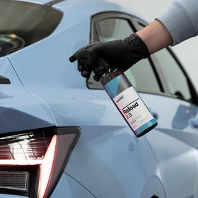 CARPRO water beading on hood illustrating strong hydrophobic water repellency