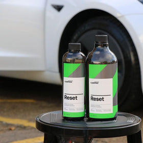 CARPRO Reset bottle in wash bucket setup showing proper two-bucket technique benefit