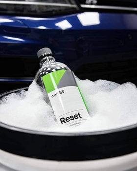 CARPRO Reset bottle texture close-up emphasizing premium formula and purity