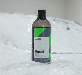 CARPRO Reset used on a coated vehicle highlighting preserved gloss and beading