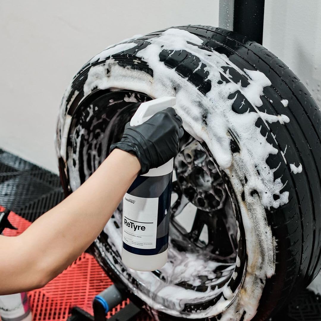 CARPRO cleaned tire beside untreated tire showing restored new-look benefit