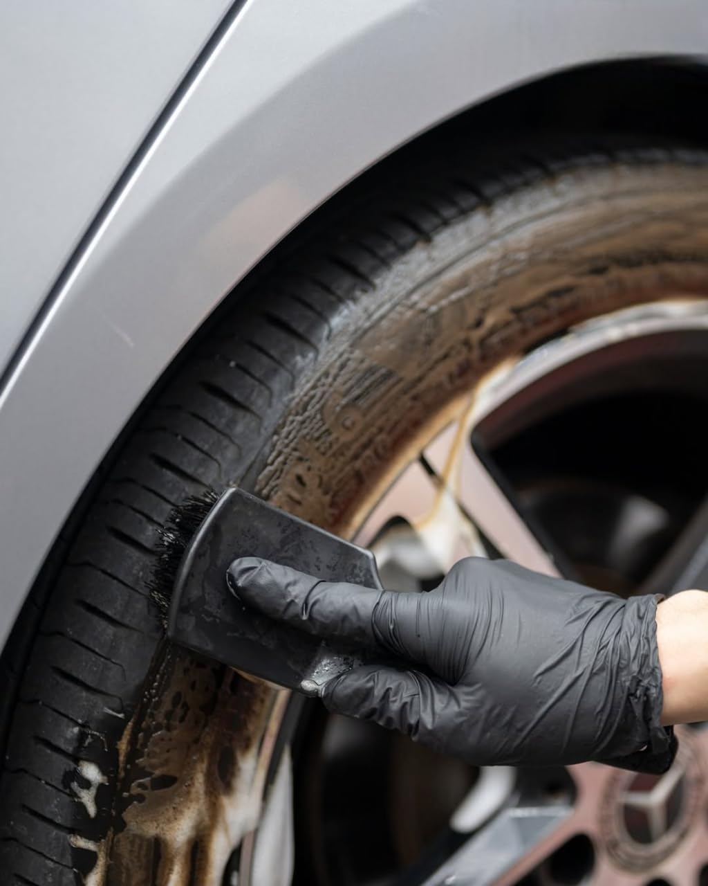 CARPRO cleaned tire ready for CQUARTZ BlackOut sealant application benefit