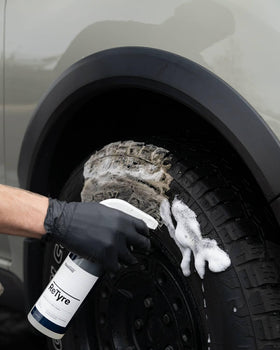 CARPRO spraying ReTyre onto tire sidewall for targeted cleaning control benefit