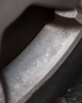 CARPRO WheelX cleaning caliper to remove grime and old sealant