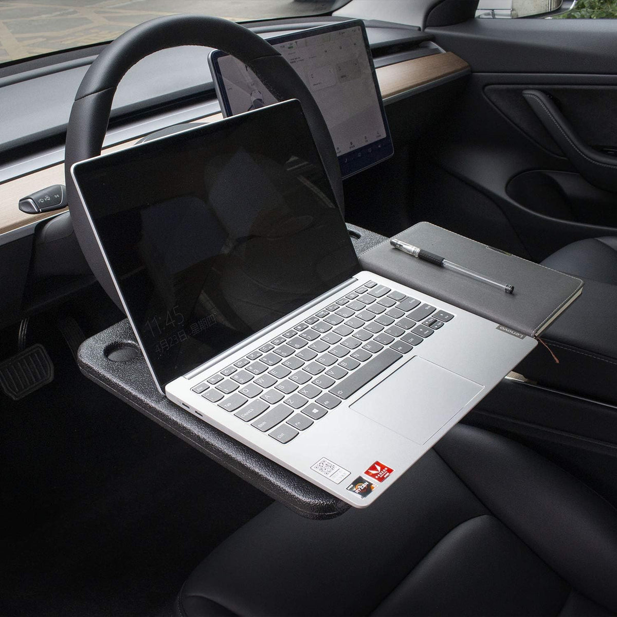 CarQiWireless flat desk surface with laptop offering a steady workspace