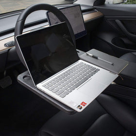 CarQiWireless flat desk surface with laptop offering a steady workspace