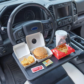 CarQiWireless front view on steering wheel shows secure fit and stability