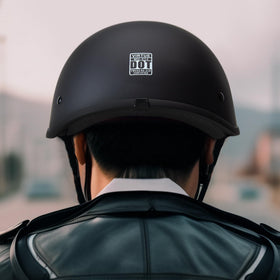 CARTMAN helmet on scooter rider in city setting illustrating everyday use