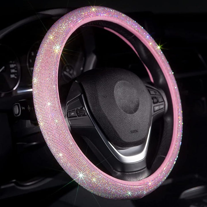 Carwales front view of pink steering wheel cover showing full bling and style benefit