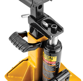 CAT jack next to toolbox showing compact storage and easy transportability