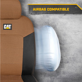 CAT lifestyle shot in a truck interior showing refreshed appearance on commute