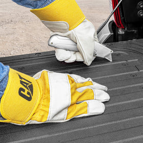 CAT tailgate mat installed on a pickup tailgate delivering a stable work surface