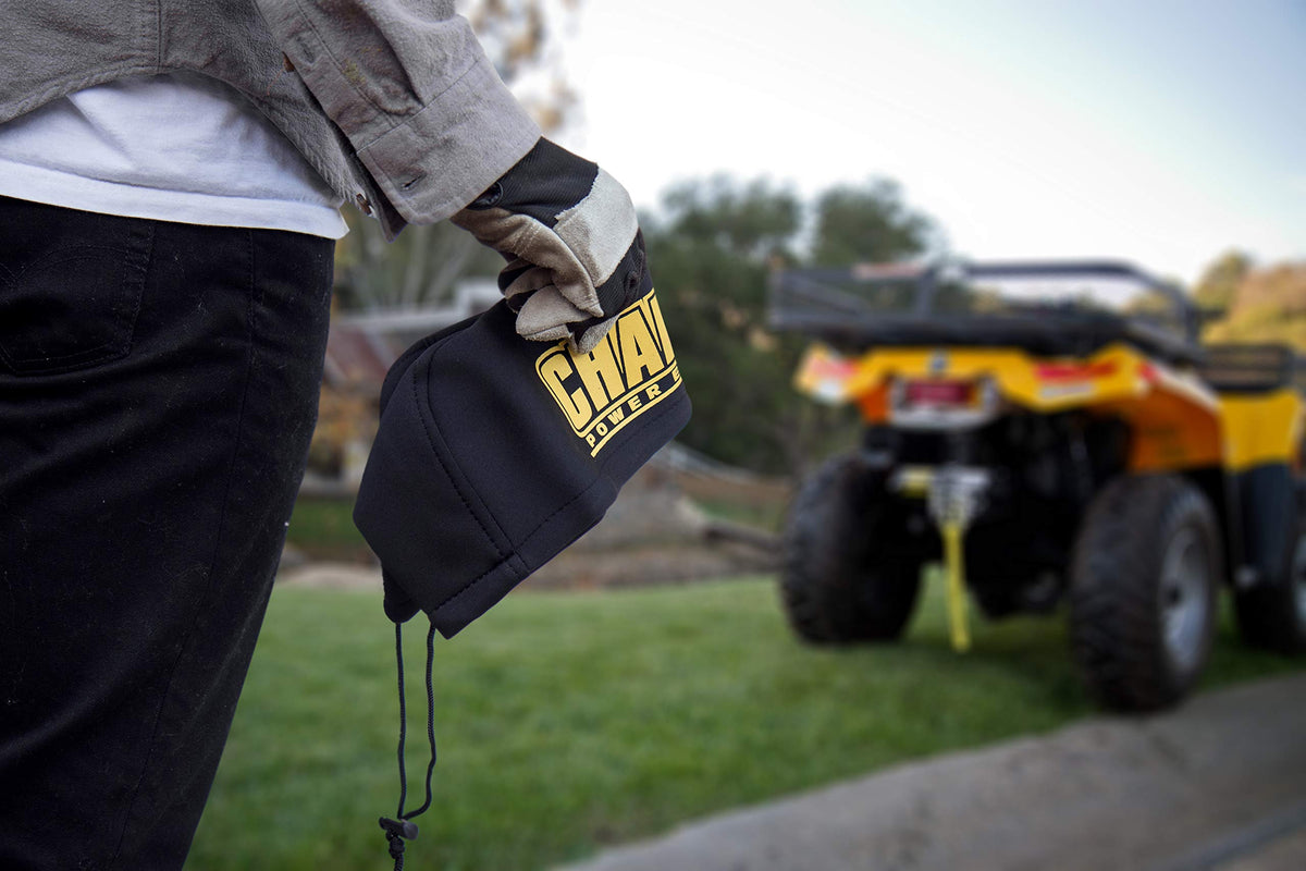 Champion winch cover installed on a mounted winch protecting from elements
