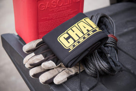 Champion cover next to winch for scale showing compatibility and size