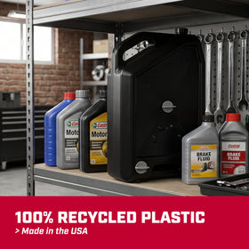 Chapin placed under lawnmower in garage for compact, mess-free maintenance