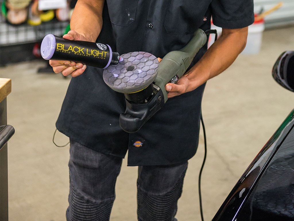 Chemical Guys before-and-after hood showing deeper gloss and reduced light swirls