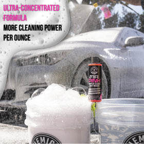 Chemical Guys two-bucket wash setup demonstrating swirl-minimizing routine