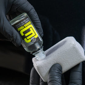 Chemical Guys treated car panel showing high gloss and deep shine after coating