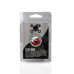 Chemical Guys clay bar close-up texture demonstrating heavy-duty contaminant removal