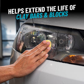 Chemical Guys clay bar being used on a car panel for contaminant removal