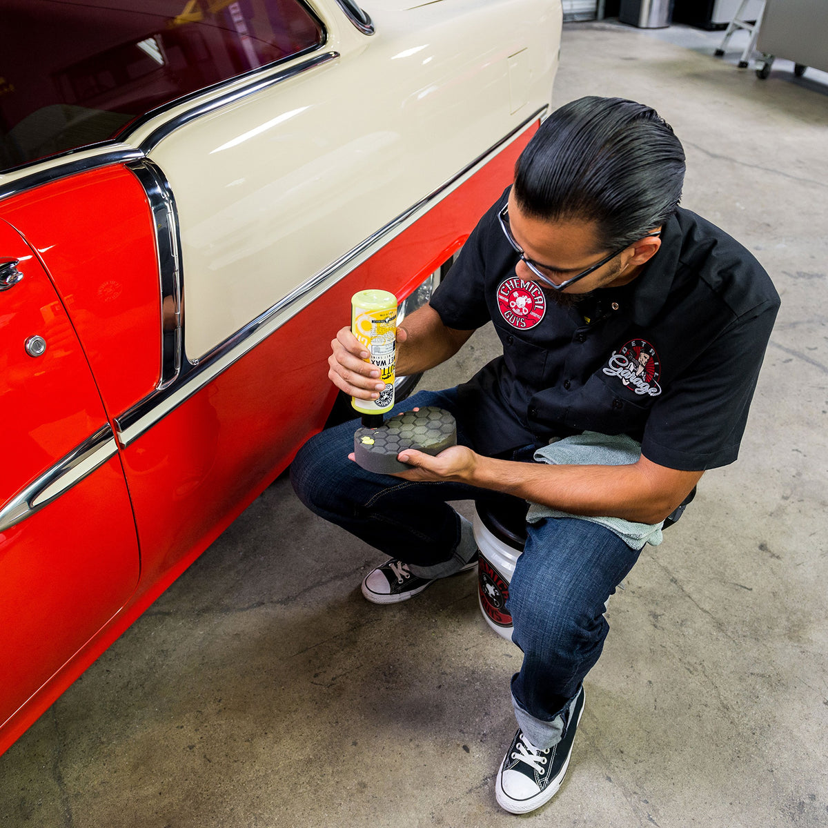 Chemical Guys full detailing collection displayed in garage for weekend use