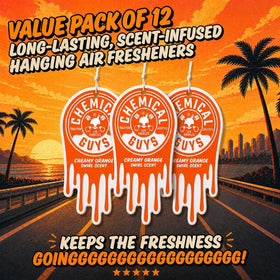 Chemical Guys hanging freshener in car rearview, adding cheerful cabin fragrance
