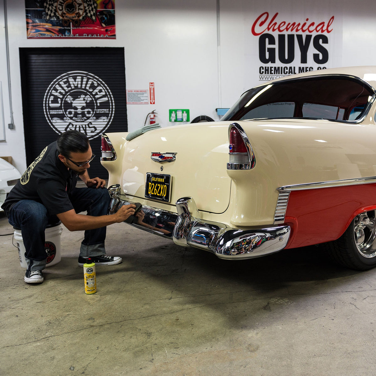 Chemical Guys kit in use washing a black car for safe swirl-free cleaning