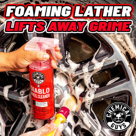 Chemical Guys Diablo bottle in hand to show size and portable convenience