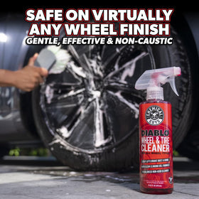 Chemical Guys 32 oz bottle held in hand to show size and convenient portability for home detailers