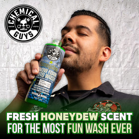 Chemical Guys used in driveway wash with owner enjoying scented foam