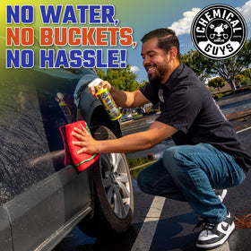 Chemical Guys HydroGlide 16 oz bottle beside hand showing product size and portability