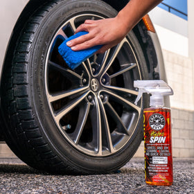 Chemical Guys HydroSpin 16 oz bottle beside a hand for scale showing travel-friendly size benefit