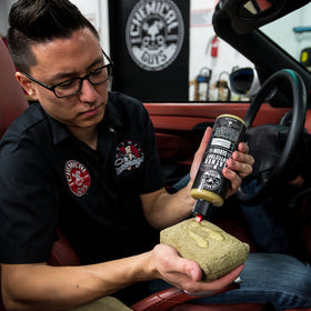 Chemical Guys 16 oz bottle next to common items showing scale and easy-storage benefit