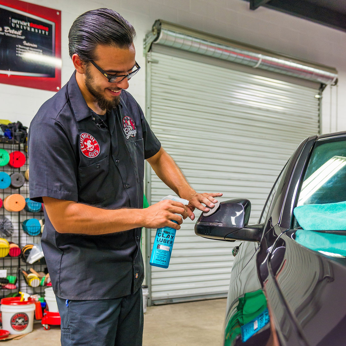 Chemical Guys detailing kit staged outdoors for convenient paint prep