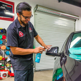 Chemical Guys detailing kit staged outdoors for convenient paint prep
