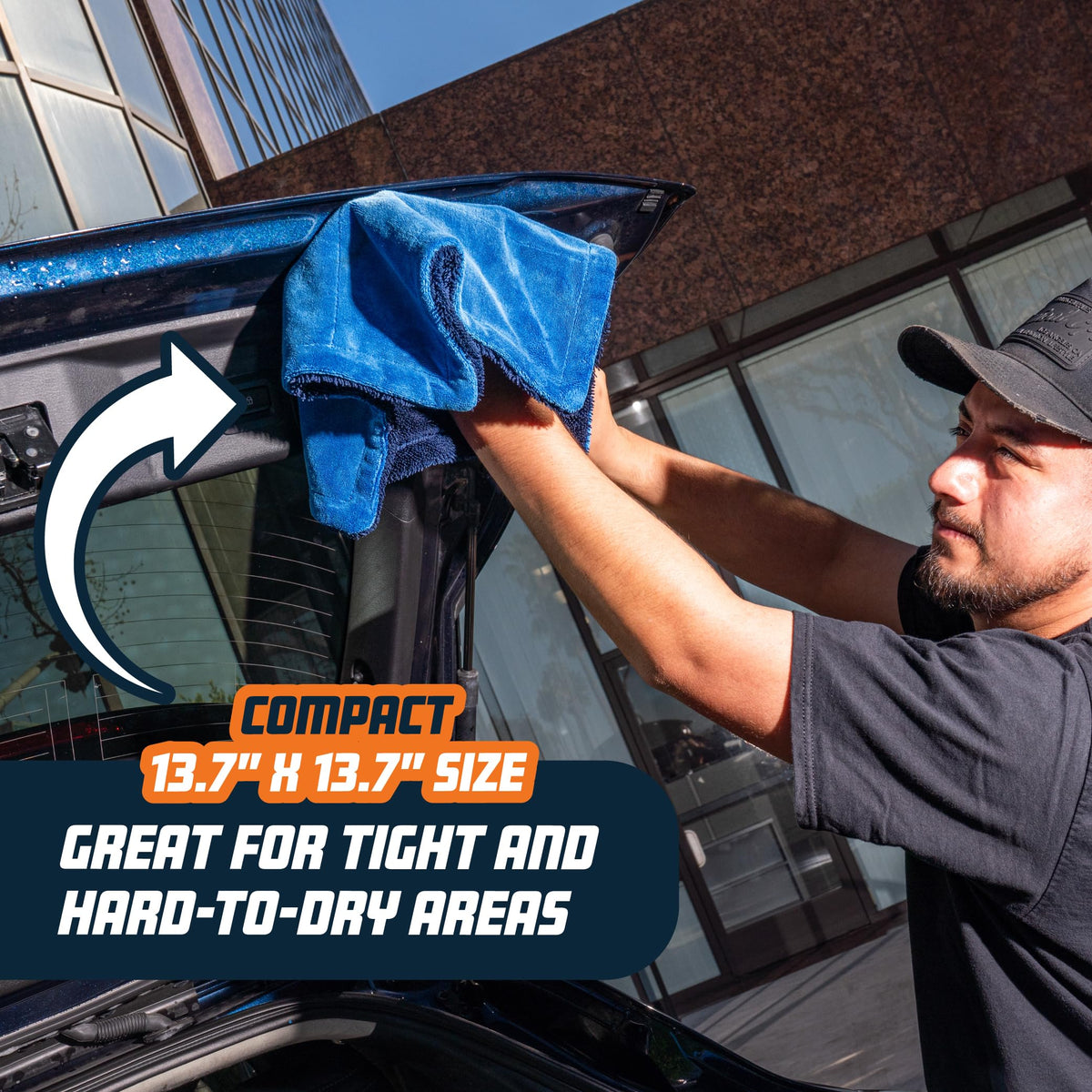 Chemical Guys Little Megalodon wiping glass delivering streak-free clarity on a car window