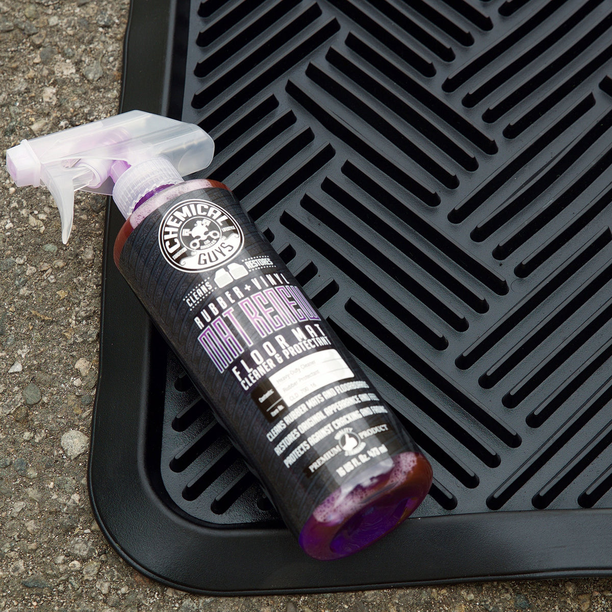 Chemical Guys kit in use with drill cleaning rubber mat for faster, thorough results