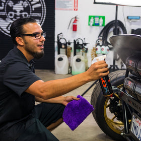 Chemical Guys being buffed with microfiber towel to produce streak-free high gloss