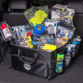 Chemical Guys organizer placed in car trunk to prevent shifting while driving