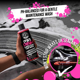Chemical Guys products applied while washing car door showing safe paint lubrication benefit