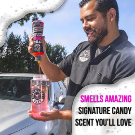Chemical Guys products staged in driveway for enjoyable maintenance washes