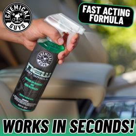 Chemical Guys being sprayed inside car interior to quickly neutralize odors