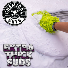 Mixing Chemical Guys soap with warm water in bucket, illustrating easy dilution and foaming