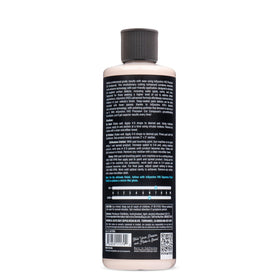 Chemical Guys V43 in a detailing bay setting conveying professional-level results