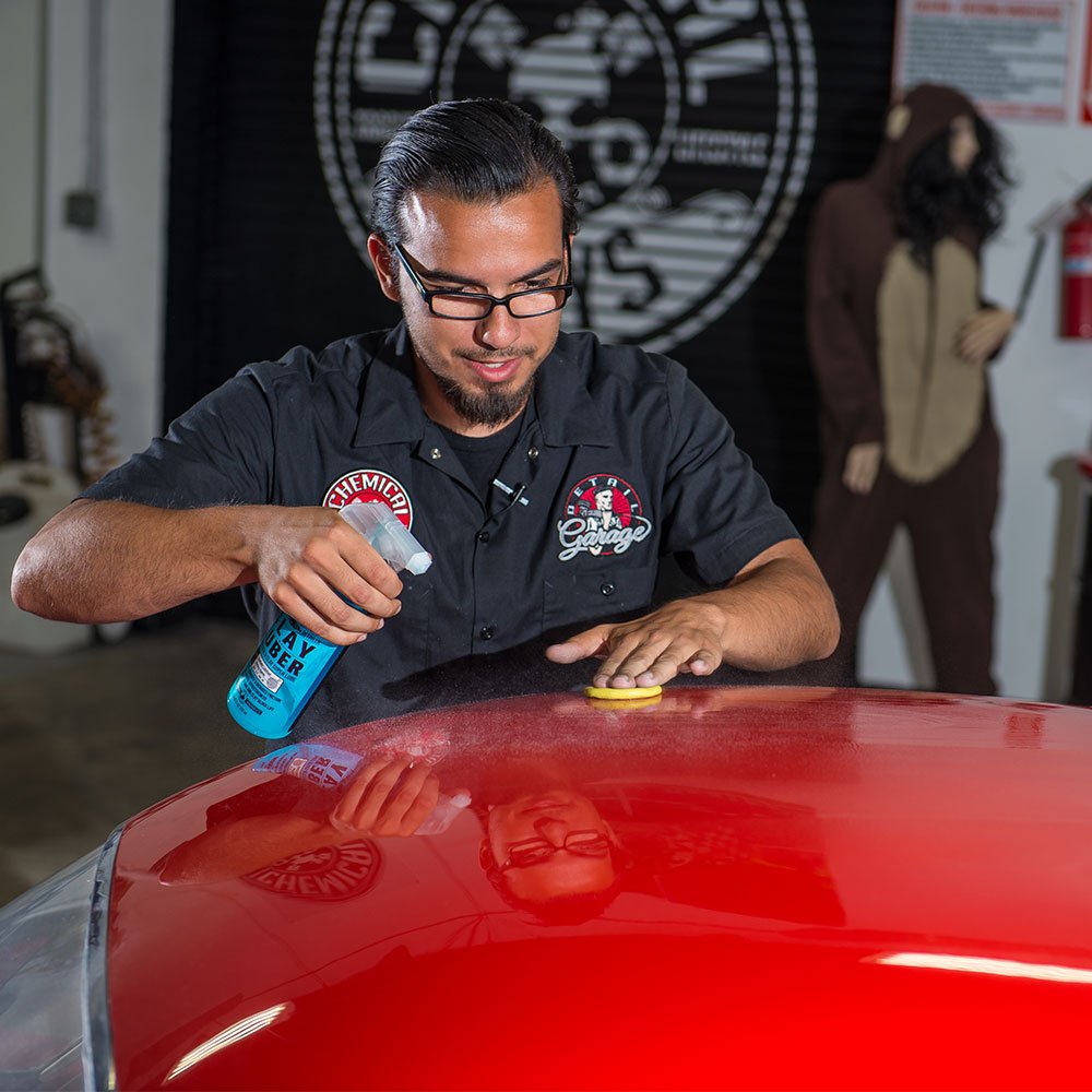 Chemical Guys kit used during an outdoor vehicle detailing session for enhanced shine