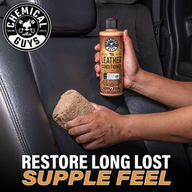 Chemical Guys applying conditioner to car seat restoring suppleness