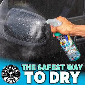 Chemical Guys wash mitt gliding on car panel for safe dirt lifting action