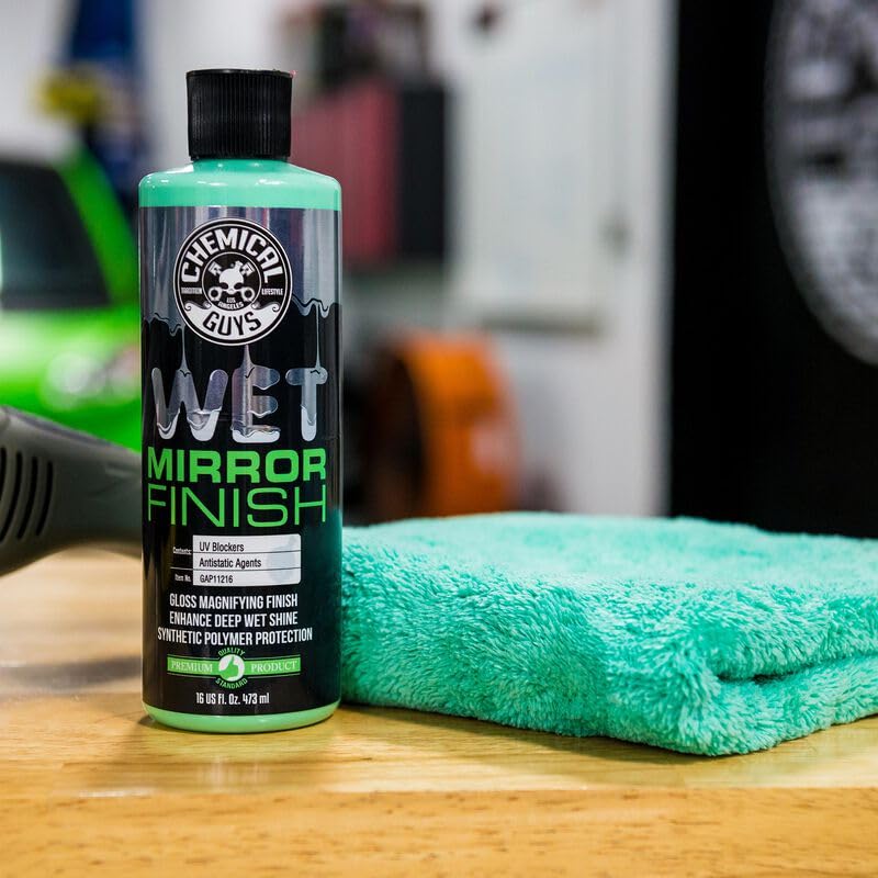 Detailer using Chemical Guys Wet Mirror Finish on a car showing showroom-level finish benefit