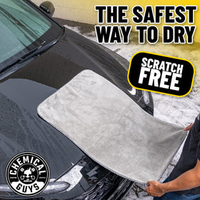 Chemical Guys towel in a garage setting showing professional detailing convenience