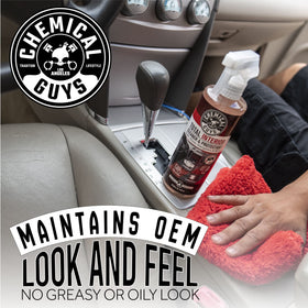 Chemical Guys bottle in hand showing 16 oz scale for storage and portability benefit